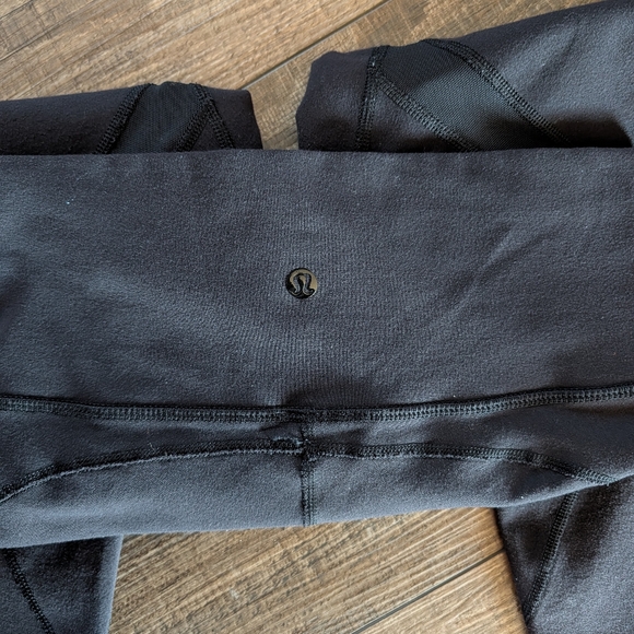 Lululemon Black High Waisted Yoga Cropped Pants w/ Mesh Cutouts - Picture 4 of 6